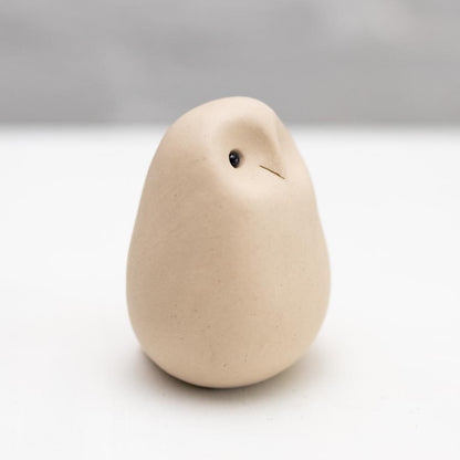 Small white ceramic owl