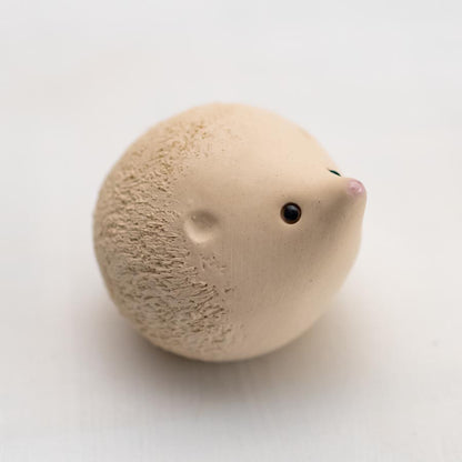 Small ceramic Snowy white hedgehog sculpture
